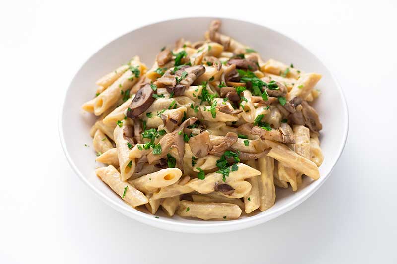 Pasta con salsa cremosa de calabaza y setas