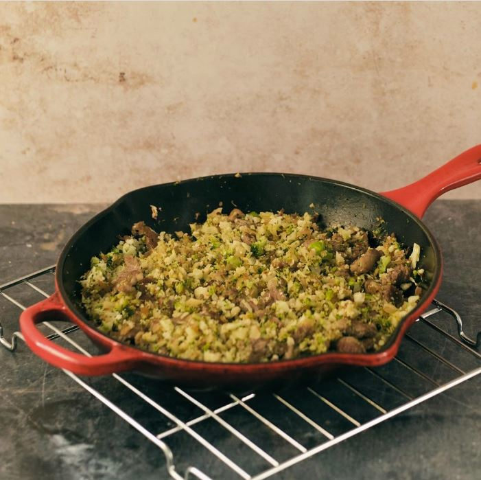 Arroz de brócoli y coliflor con secreto ibérico